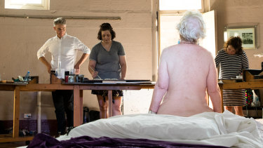 Steven Alderton, director of the National Art School with a life drawing class.  