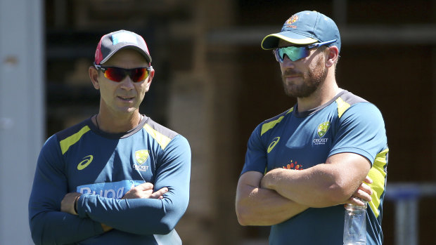Easy call: Aaron Finch (right) with Australian coach Justin Langer last week.