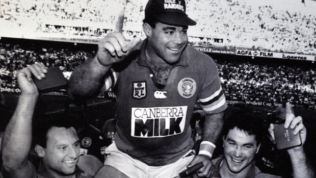 Canberra hero: Mal Meninga is chaired off the field after leading the Raiders to grand final victory over Canterbury in 1994.