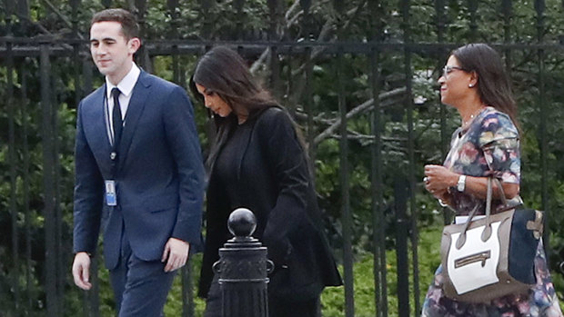 Kim Kardashian arrives at the White House with her attorney Shawn Chapman Holley.
