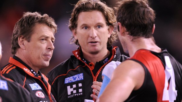 Mark Thompson with James Hird and Jobe Watson in 2012.