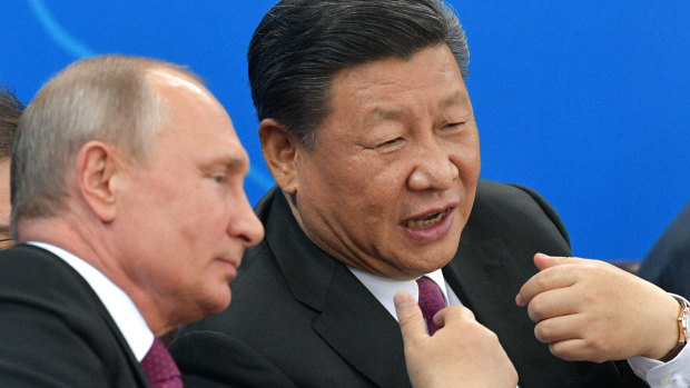 Russian President Vladimir Putin, left, and Chinese President Xi Jinping on Friday.