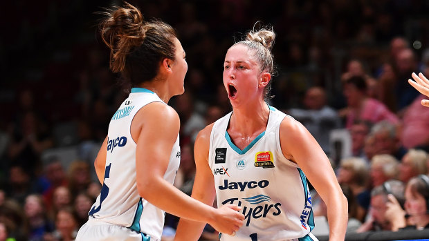 On point: Rebecca Cole (right) top-scored in Southside's semi-final win over Adelaide.