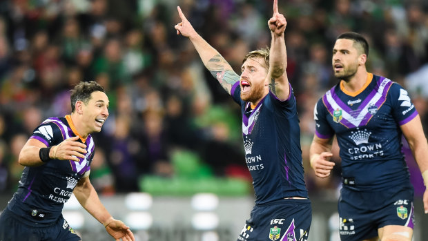 Making a point: Cameron Munster reacts after sealing victory for the Storm with a field goal. 