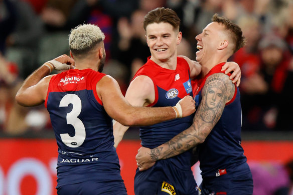 Christian Salem (left) and Bayley Fritsch (centre) are two big omissions for Melbourne’s season opener against the Western Bulldogs.