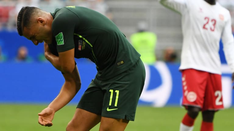 Sidelined: Andrew Nabbout is injured against Denmark at the World Cup.