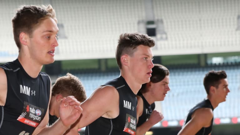 Sam Walsh  (centre) during the AFL draft combine.