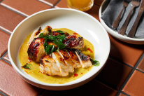Monal Dining’s roasted chicken glazed with lemon molasses and finished with a curry sauce.