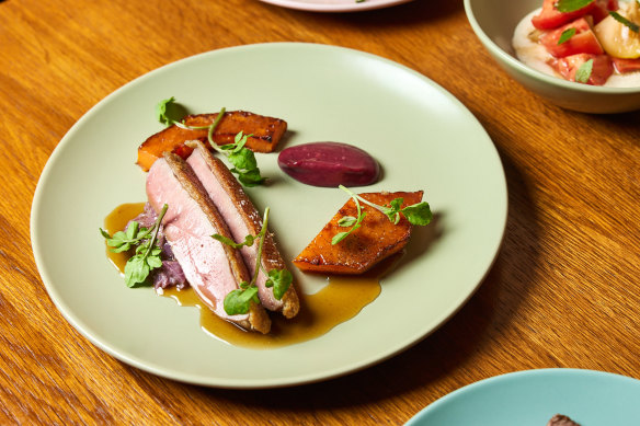 Pan-roasted duck with red kuri pumpkin, creamed cabbage and plum custard.