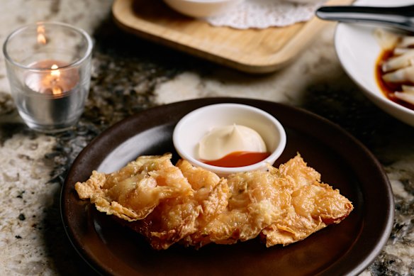 Fu pei gyun (crispy tofu skin roll) with prawn.