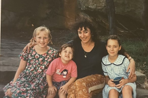 From left: the author, 9, sister Tayla, 2, their mother Lisa and Rhiannon,
12, on a supervised visit in 1995 (the children were in foster care at the time).