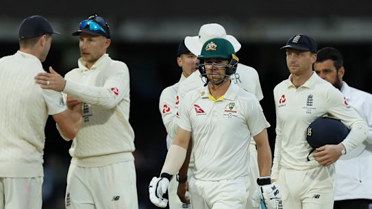 Travis Head walks from the pitch as players shake hands at the end of the second Test at Lord's.
