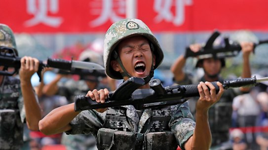 Chinese People's Liberation Army soldiers demonstrate their skill during an open day of Stonecutter Island naval base, in Hong Kong in June. 