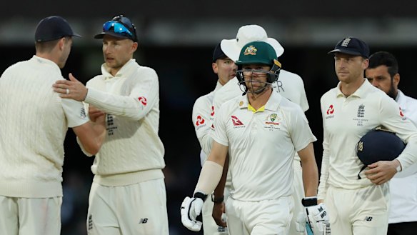 Travis Head walks from the pitch as players shake hands at the end of the second Test at Lord's.