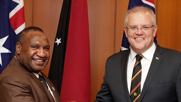 Prime Minister Scott Morrison was due to meet PNG PM James Marape, left, next week.