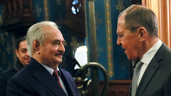 Russian Foreign Minister Sergey Lavrov, right, shakes hands with Khalifa Hifter, the head of the self-styled Libyan National Army prior to talks in Moscow, Russia in January.