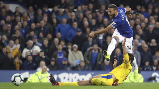 Everton's Cenk Tosun scores his side's second goal against Crystal Palace at Goodison Park on Sunday.