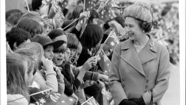 The Queen talks to some of the children who welcomed her to Melbourne