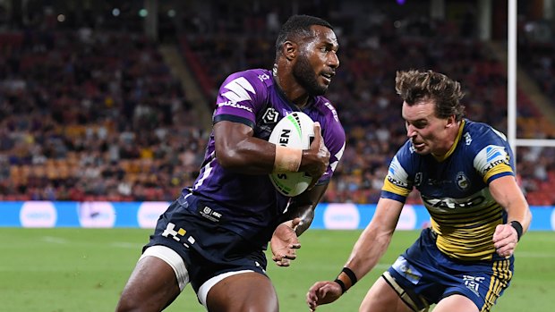 Vunivalu scores a try against the Eels in October. 