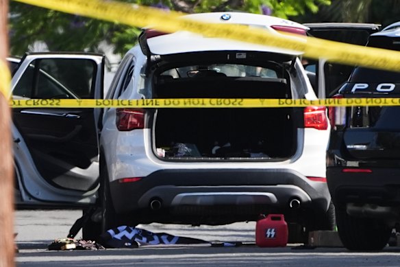 A vehicle is being sought after the attack. A canister bearing the insignia of the Nazi paramilitary SS can be seen.