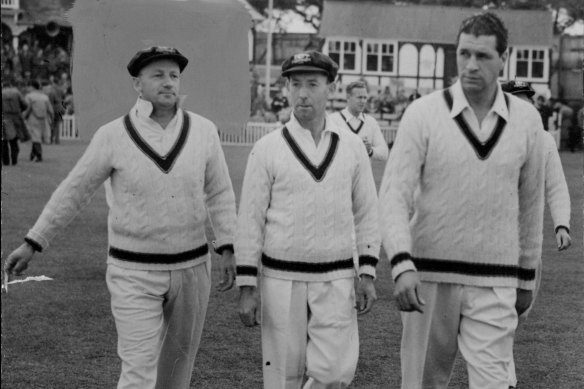 Don Bradman, left, leads Australia on to the field for their tour match with Worcestershire during The Invincibles tour in 1948.