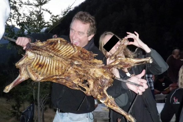 Robert F Kennedy Jr poses with an animal carcass in 2010.