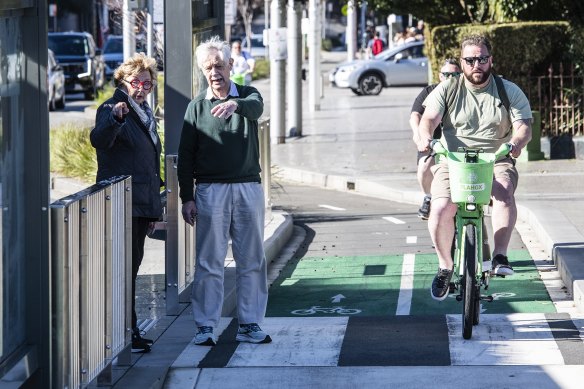 Kathryn Greiner and Michael Waterhouse allege the Oxford Street cycleway discriminates against the elderly and the disabled because it will use seven “floating” bus stops. Pedestrians will need to cross the bike lane to catch a bus.