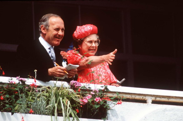 The Queen at a horse race with her Australian private secretary, William Heseltine.