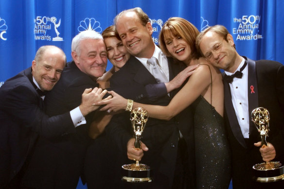 The cast of Frasier – Dan Butler, John Mahoney, Peri Gilpin, Kelsey Grammer, Jane Leeves, and David Hyde Pierce – at the 1998 Emmy Awards, where the series broke an Emmy record by winning for the fifth time.