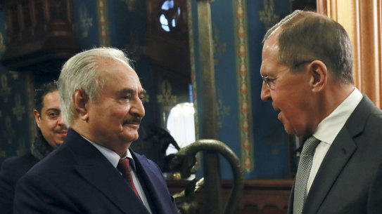 Russian Foreign Minister Sergey Lavrov, right, shakes hands with Khalifa Hifter, the head of the self-styled Libyan National Army prior to talks in Moscow, Russia in January.