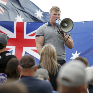 Right-wing figure Blair Cottrell addresses a rally in St Kilda. 