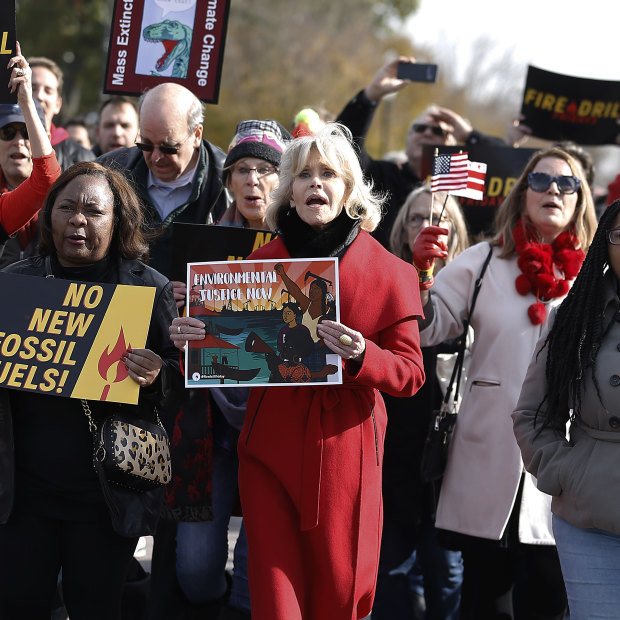 Demonstrating at a Fire Drill Fridays event in 2019. Fonda says the stand-out red coat will be the last new item of clothing she will buy.