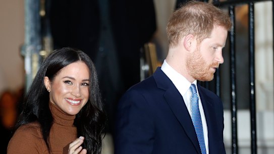 Britain's Prince Harry and Meghan, Duchess of Sussex, leave after visiting Canada House in London.