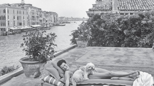 A scene from the Grand Canal, Peggy Guggenheim on the roof top of her house