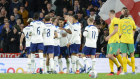 The Socceroos look on as England celebrate Ollie Watkins’ goal at Wembley.