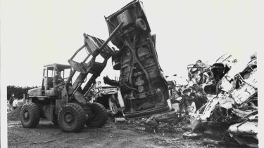 A photo from 1984, when a loader and compactor moved in on the derelict cars that have been home to eastern barred bandicoots at the Hamilton tip.  