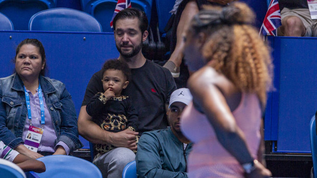 Serena Williams' daughter watches on as her mother competes in the Hopman Cup.