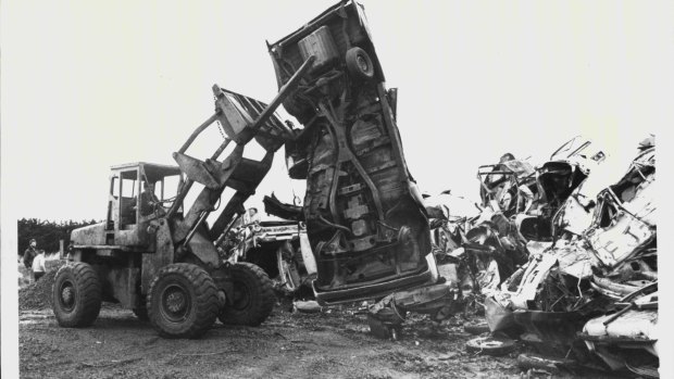 A photo from 1984, when a loader and compactor moved in on the derelict cars that have been home to eastern barred bandicoots at the Hamilton tip.
