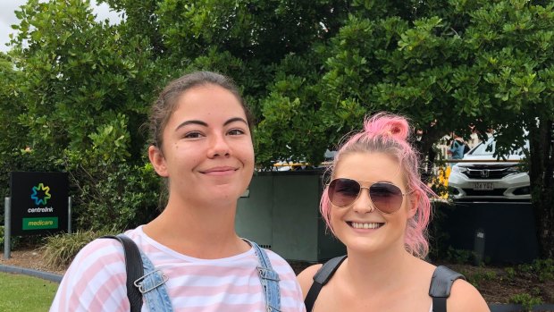 Cheyanne Nystrom, (left), a FIFO mine worker who lost work since the crisis began and is now job hunting at Centrelink Stones Corner in Brisbane.