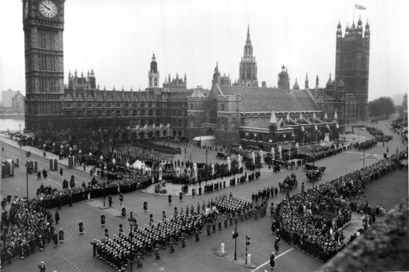 The funeral procession leaves Westminster Hall and passes through Parliament Square on its way to St. Paul's Cathedral.