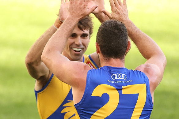 Jamie Cripps and Jack Darling celebrate a goal.