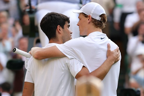 Carlos Alcaraz and Jannik Sinner embrace after the final.