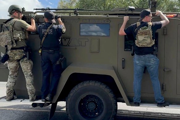 A SWAT team heads into Utah Valley University.