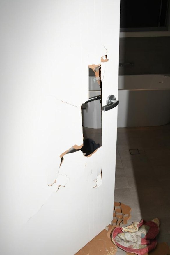 The bathroom door after the attack.