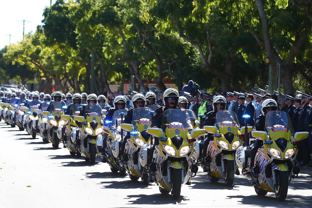 The police convoy - which featured motorbike, horses and dogs - during the final goodbye to Senior Constable Brett Forte in Toowoomba on June 7, 2017.