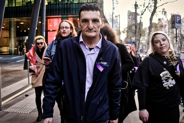 Danny Jeffcote marches on Thursday night for a vigil for victims of overdose in the CBD.