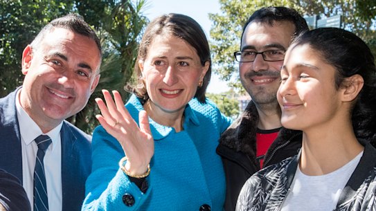Premier Gladys Berejiklian and Deputy Premier John Barilaro with members of the public on Sunday after announcing the new ministry.