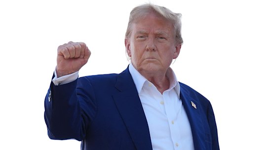 Trump boards Air Force One to fly to the NATO summit.