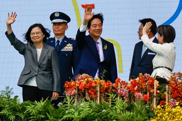 President William Lai Ching-te (centre), Vice President Hsiao Bi-khim (right) and Former Taiwanese president Tsai Ing-Wen wave during the Taiwanese Presidential Inauguration Ceremony.
