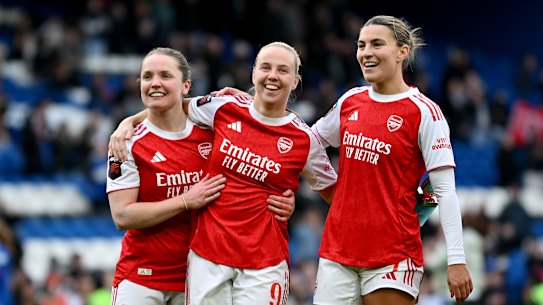 Beth Mead, Kim Little and Steph Catley celebrate Arsenal’s win.